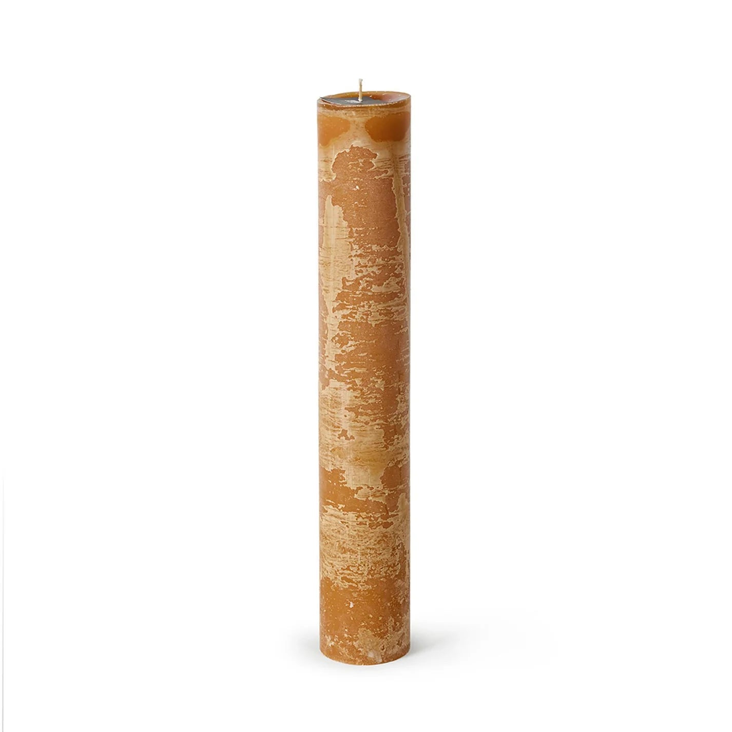 A tall, cylindrical, yellow candle with a weathered, textured surface standing upright against a plain white background.