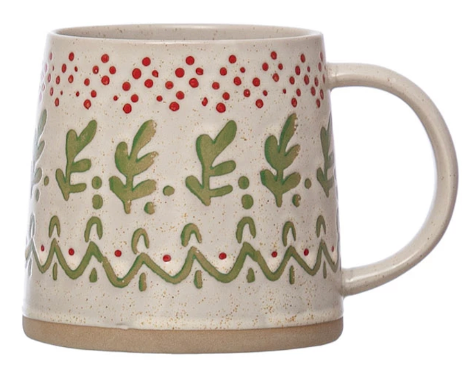 ceramic mug with festive, hand-painted designs featuring plants, patterns, and holiday-themed colors on a beige base.