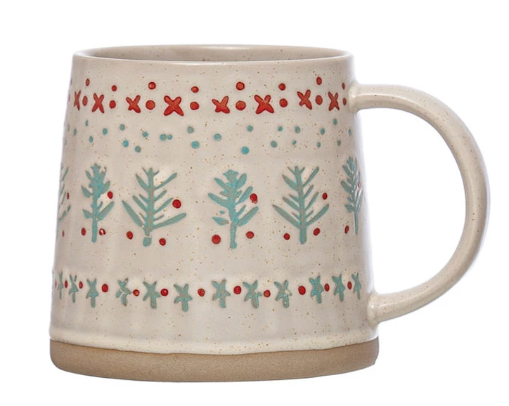 ceramic mug with festive, hand-painted designs featuring plants, patterns, and holiday-themed colors on a beige base.